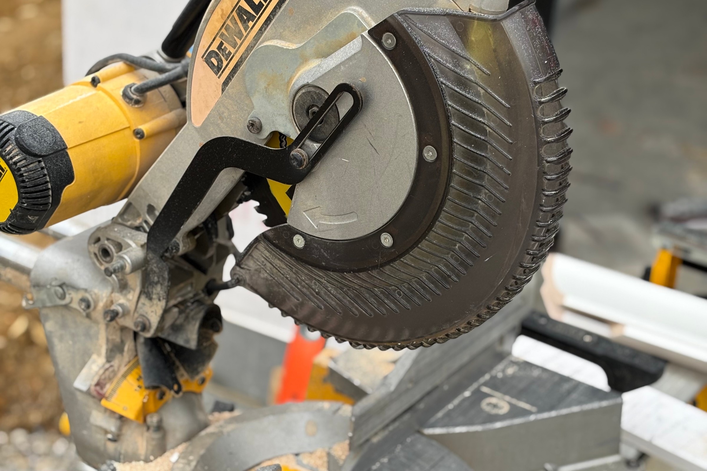 A miter saw set up on a Dunn Trim Co. finish carpentry job site in East Tennessee