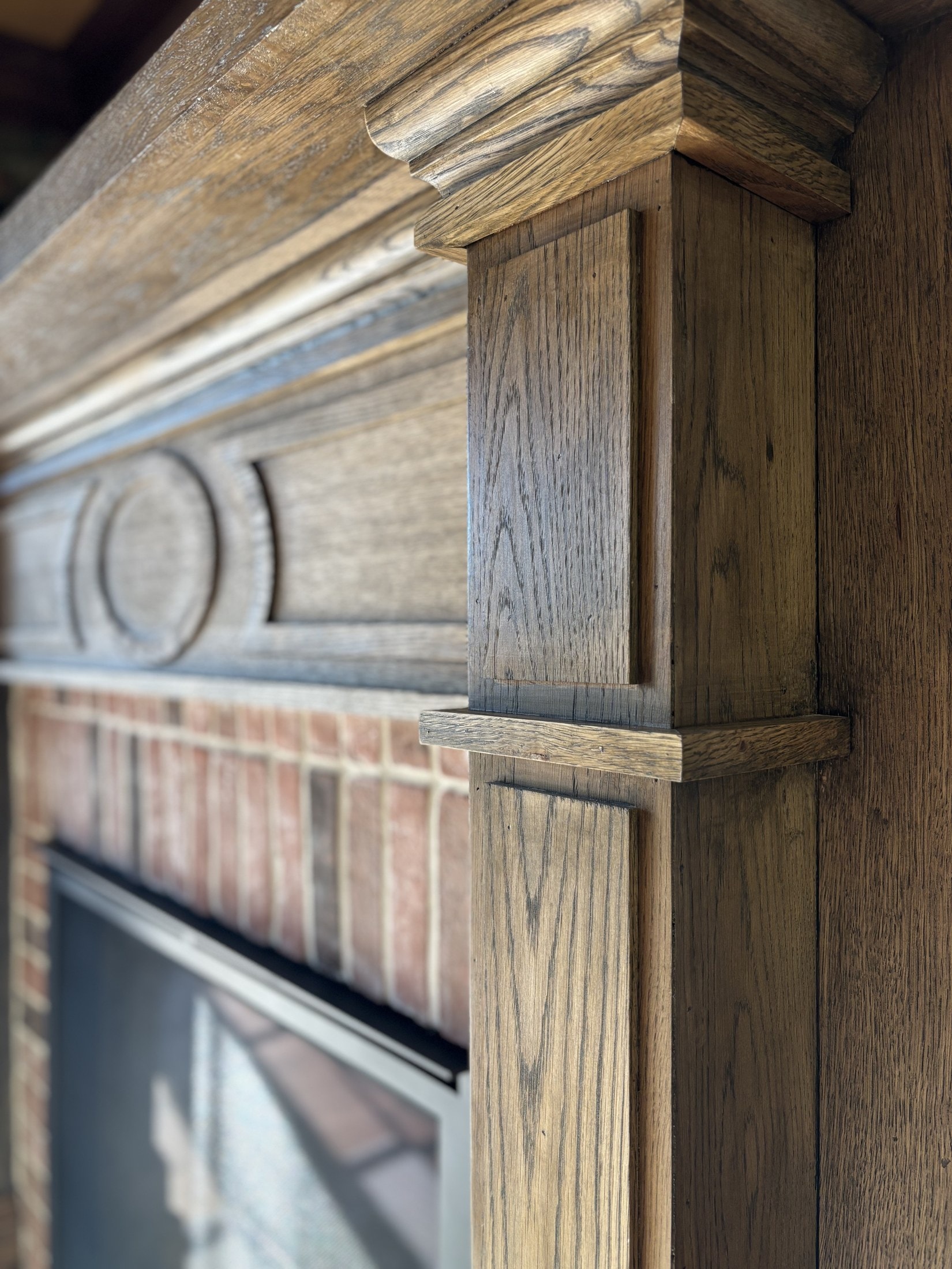 Solid oak fireplace mantel with bracket detail