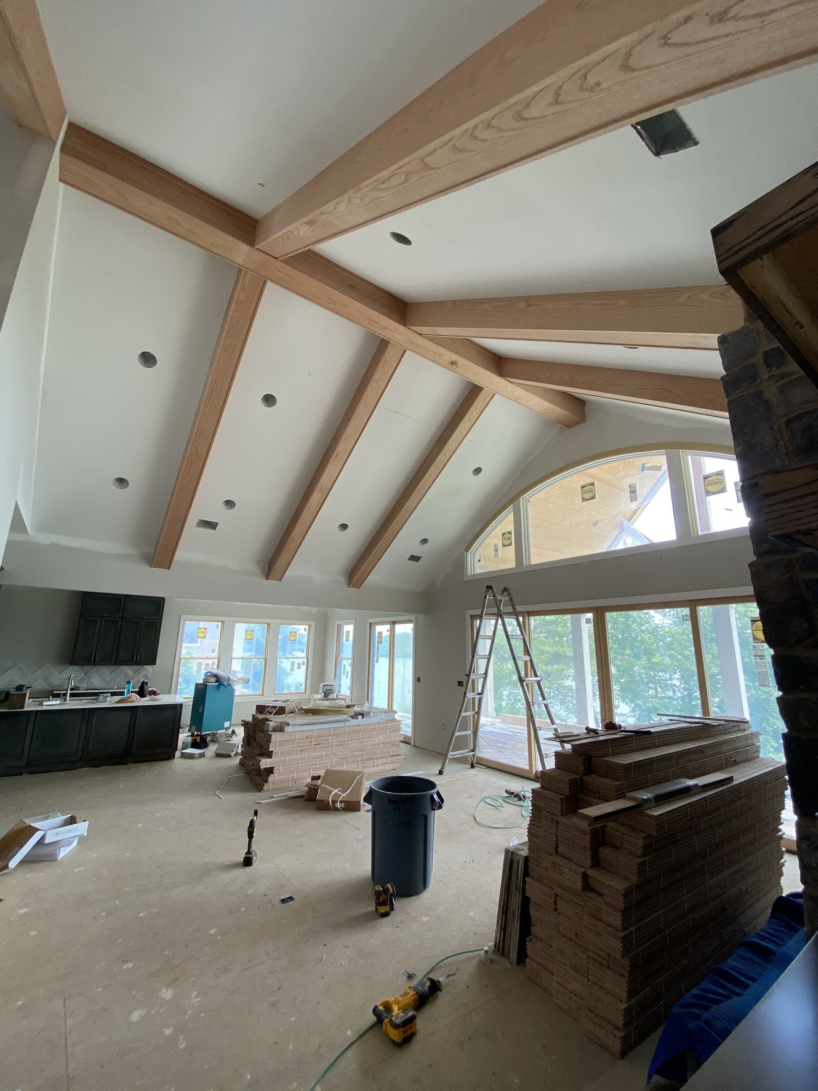 Vaulted great room with a red oak box-beam ceiling