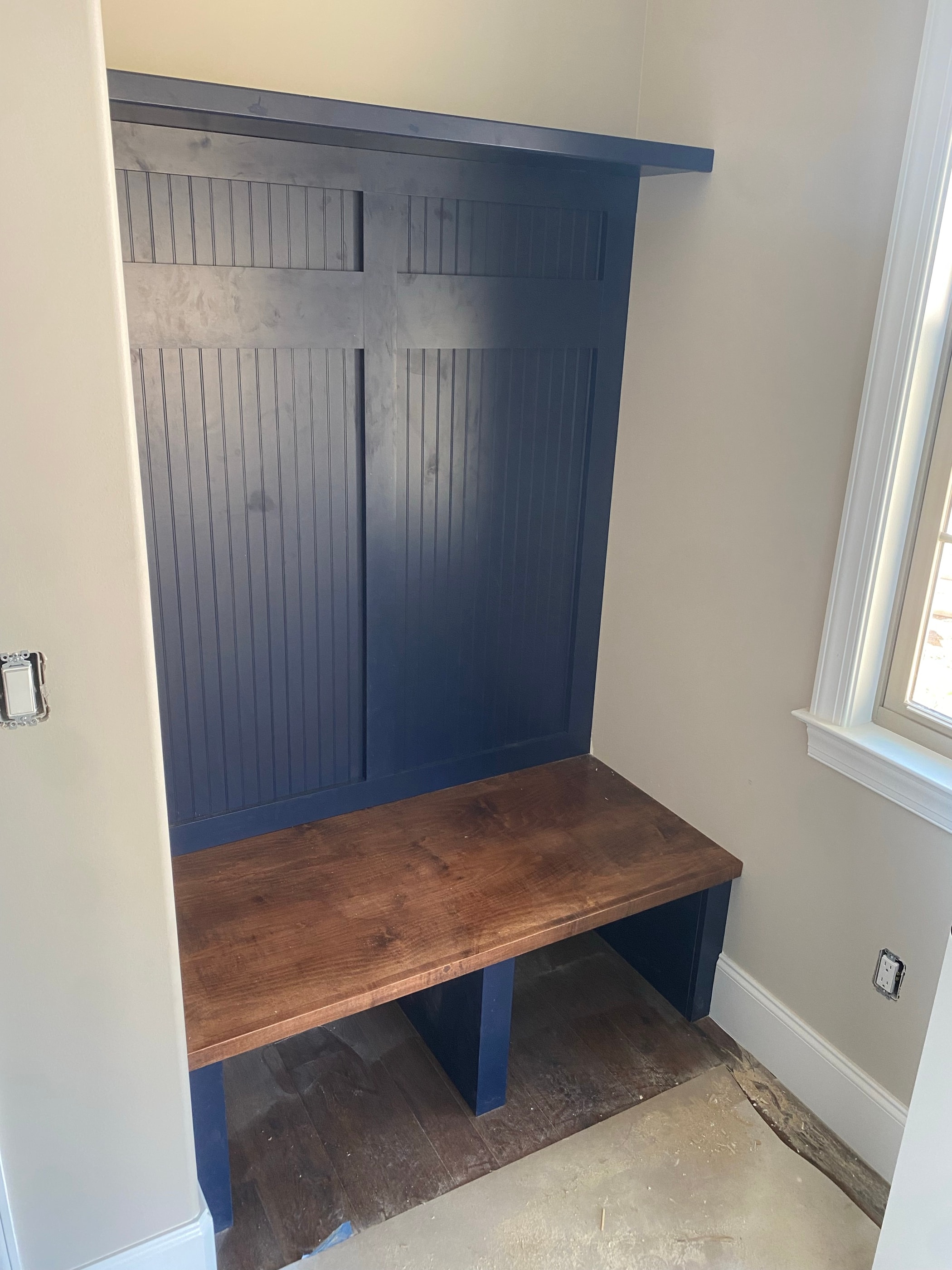 Navy mudroom built-in bench with cubbies